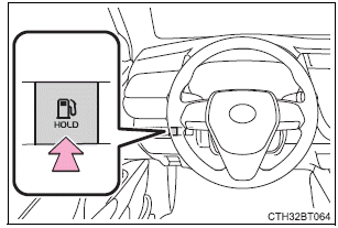 Opening the fuel tank cap