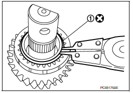 Reverse idler shaft and gear