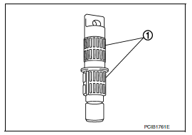 Reverse idler shaft and gear