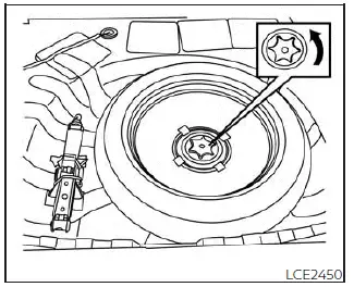 Nissan Sentra spare tire jack and tools location